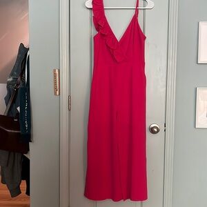 Only worn once! Hot pink jumpsuit with ruffle detail